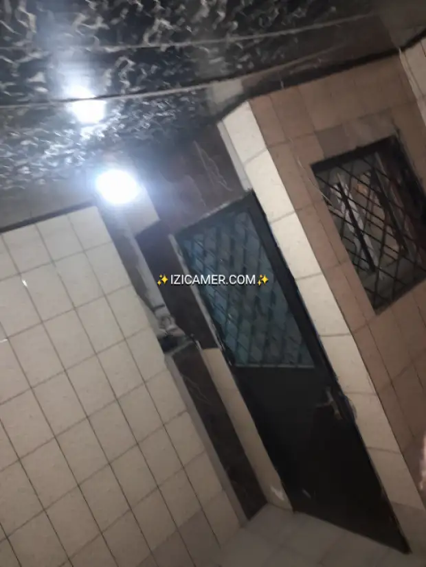Maison a vendre a côté du goudron à akwa nord de l'axe principale de 4chambres 2douches